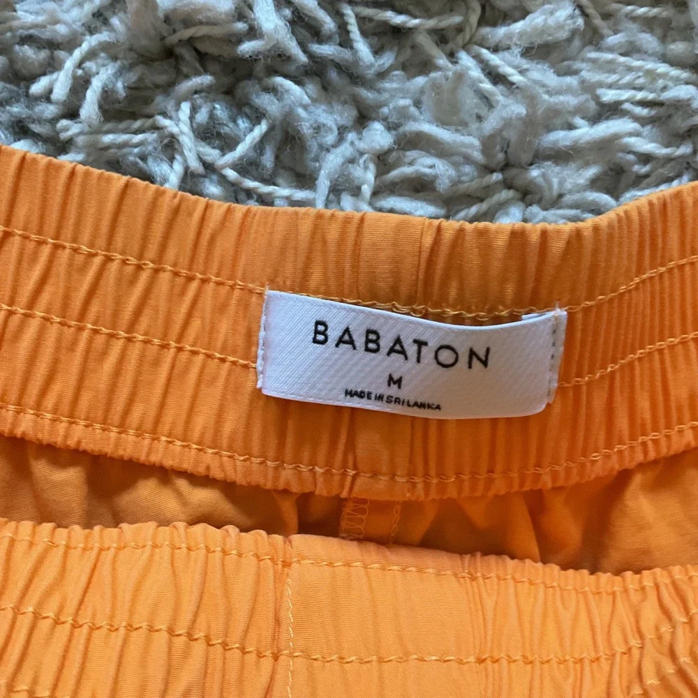 Babaton Women Orange Elastic Waist Athletic Shorts Size M 2291
